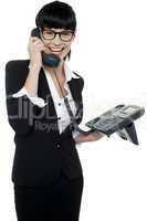 Professional lady speaking on phone