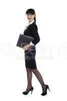 Cheerful smart business lady walking with files