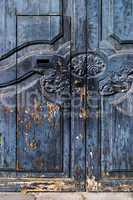 Rustic Spanish door with flaking paint