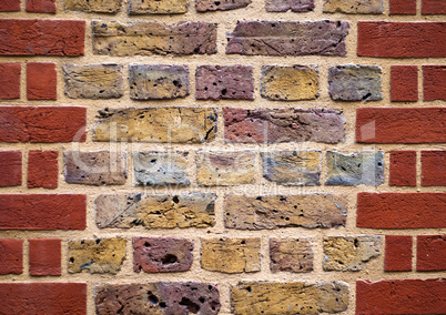 Red brick wall with white brick decoration