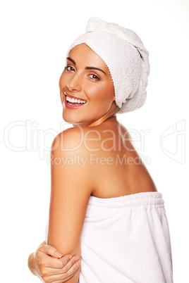 Laughing beauty in a bathrobe