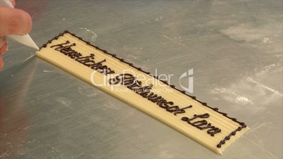 10741 german bakery write with chocolate