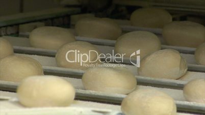 german bakery roll bun on conveyor belt close 10743