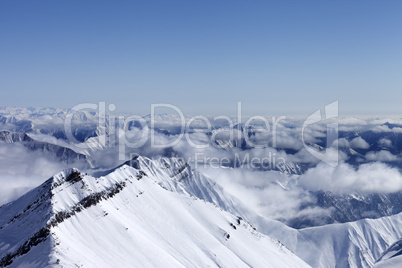 High mountains in haze. Caucasus Mountains.