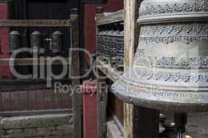 bell and prayer wheels in nepal