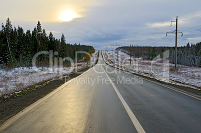 Road asphalt and winter twilight