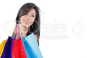 Portrait of a beautiful woman with colored shopping bags isolate