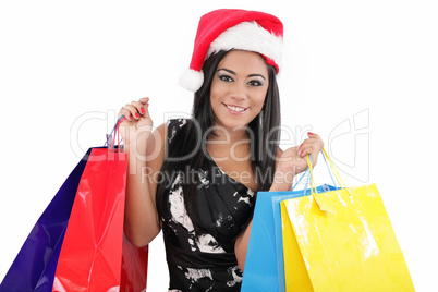 portrait of a happy santa woman with shopping bags