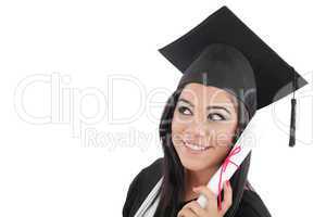 Thoughtful graduation woman with diploma looking on copy space