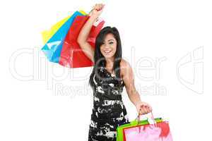 Young woman with shopping bags over white background