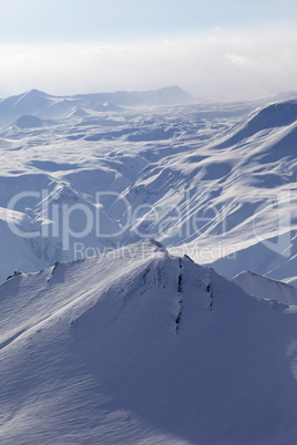 Snowy mountains in haze