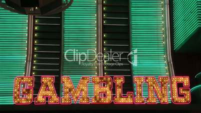 The word Gambling in neon lights