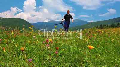 photographer on a background of mountain scenery