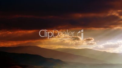 Sunset clouds over the mountains