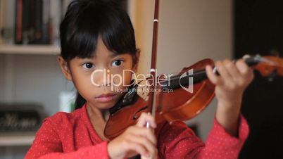 Proud Girl Finishing Practising Her Violin