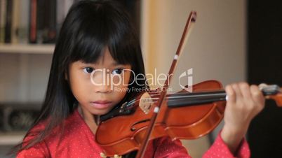 Intense 6 year Old Asian Girl Plays Her Violin