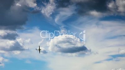 airplane on beautiful cloudy sky
