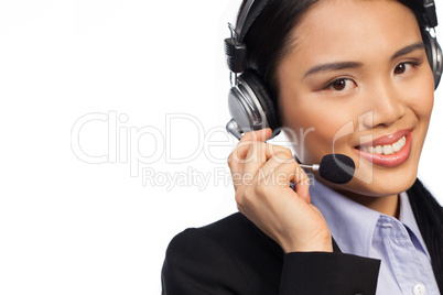 Smiling Asian woman wearing a headset