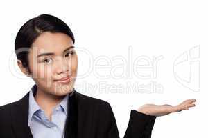Asian businesswoman holding out her palm