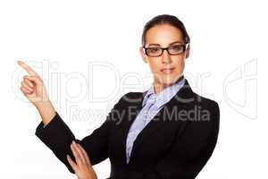 Confident business executive pointing