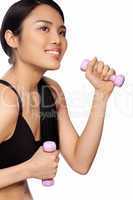 Beautiful Asian woman exercising with dumbbells