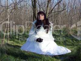 The young bride in a white dress on the nature 1