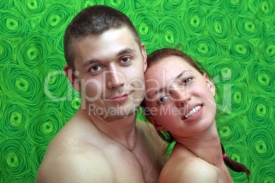 Portrait of the young beautiful couple at home