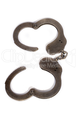 steel handcuffs. isolated on a white background.