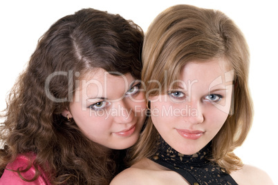 Portrait of the two beauty young women. Isolated.