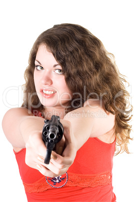 Young woman with a revolver. Isolated on white background