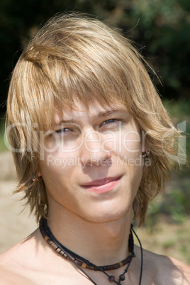 portrait of the young man outdoors