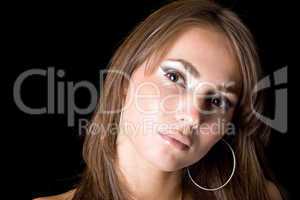 Portrait of the young woman. Isolated on black background