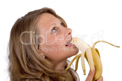 Portrait of the young woman with a banana. Isolated