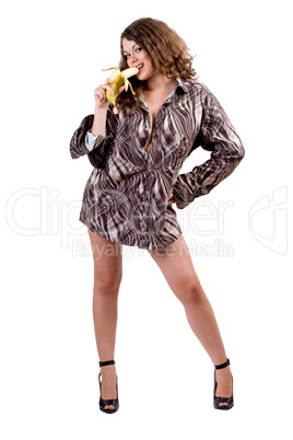 young sexy beauty woman in a man's shirt with a banana. Isolated young sexy beauty woman in a man's shirt with a banana. Isolated