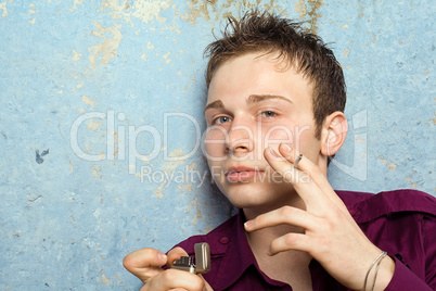 portrait of the young man with a cigarette and a lighter 2