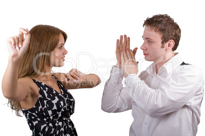 The dancing young beauty couple. Isolated on white