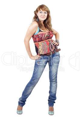 The beautiful young woman in blue jeans. Isolated on white backg