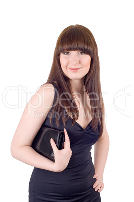 Portrait of the smiling young woman with a handbag in a black dr