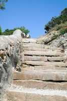 Ladder from a light stone in mountains