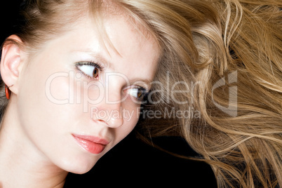 Portrait of the young beauty woman. Isolated on black background