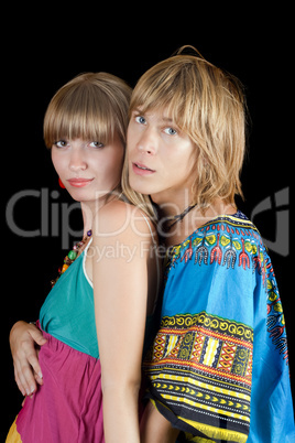 Portrait of the young beauty couple. Isolated on black backgroun Portrait of the young beauty couple. Isolated on black backgroun