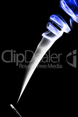 Stick with a blue smoke. Isolated on a black background