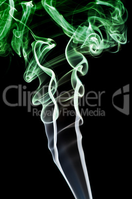 Abstract green smoke. Isolated on a black background