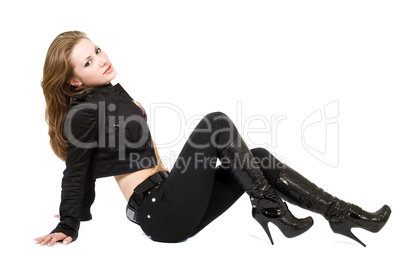 The young beautiful woman in black suit. Isolated