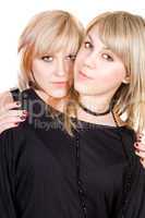 Portrait of  the two young beauty blonde. Isolated
