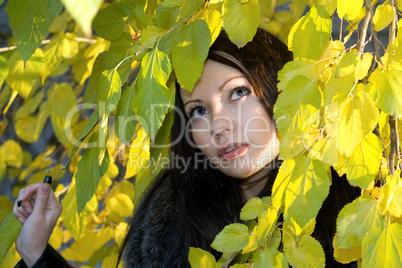 Portrait of the young woman in foliage Portrait of the young woman in foliage