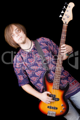 The young man with a guitar over black