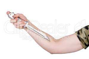 Knife in a man's hand. Isolated on white