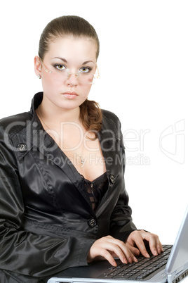 Businesswoman works on the laptop over white