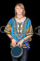 The young man plays a drum. Isolated